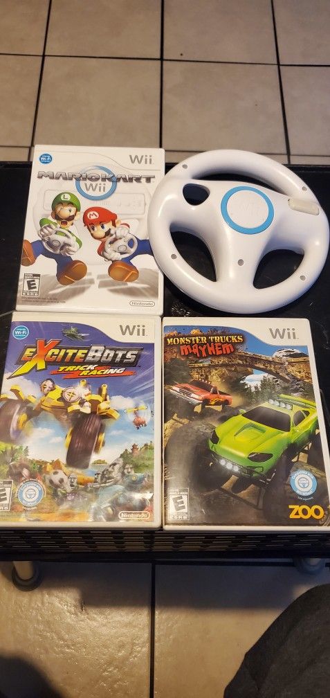 Nintendo Wii Complete Games & Wheel