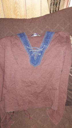 Brown long sleeve sweater.