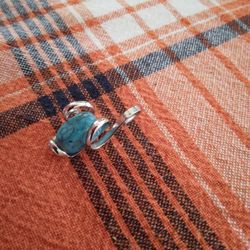 Silver And Turquoise Pendant.