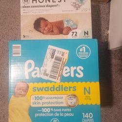 2 Boxes Of Newborn Diapers