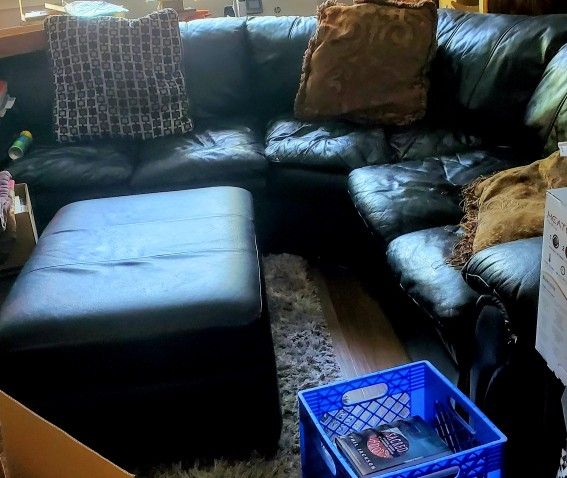 Black 3 Piece Leather Sectional And Large Storage Ottoman