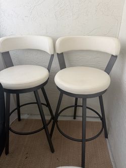 2 bar height white stools