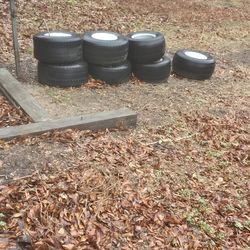 Old golfcart wheels and rims.
