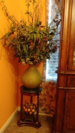 Marble stand and flower arrangement