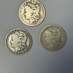 3 Morgan Silver Dollars…..$90