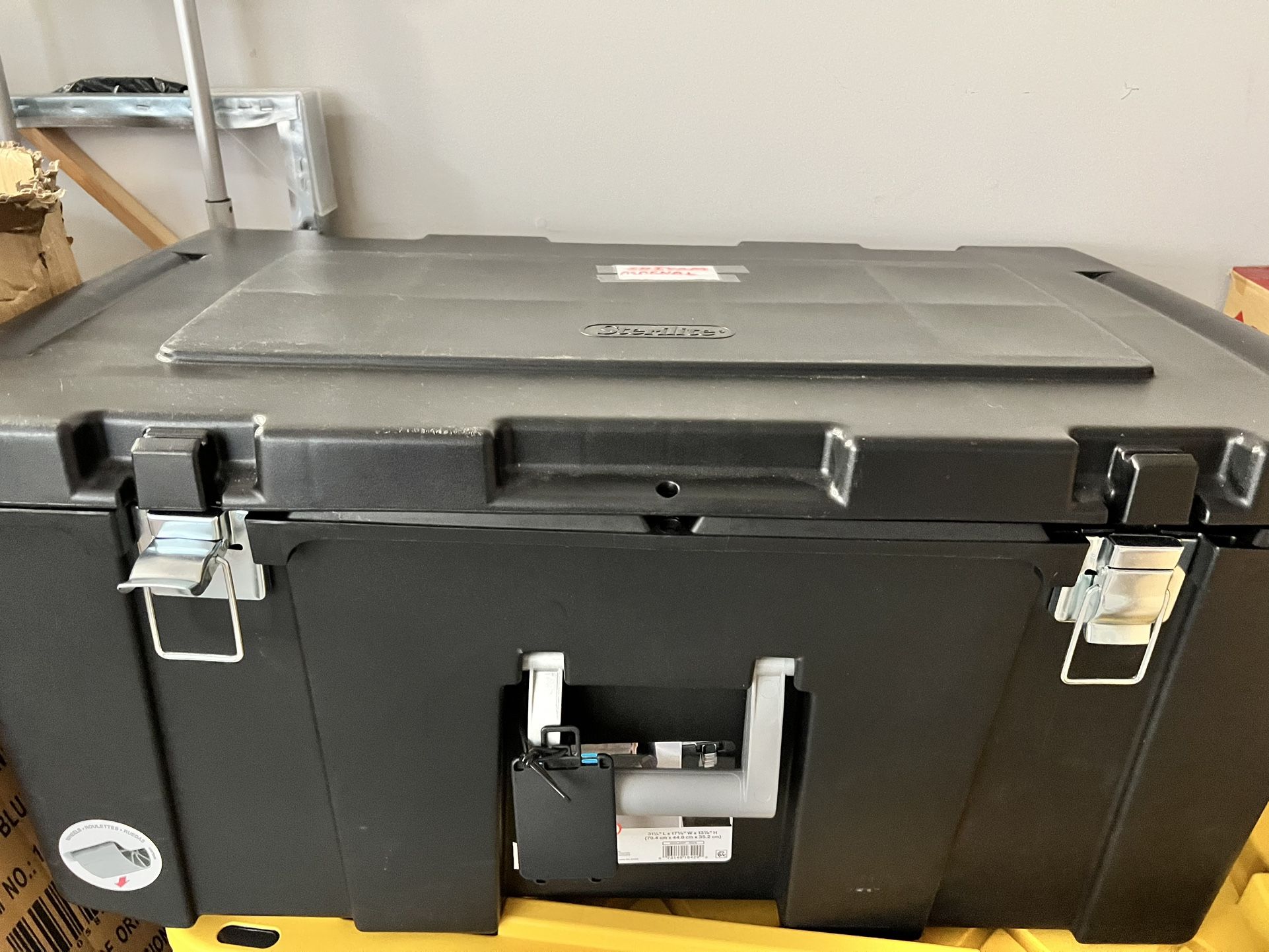 Sterilite Footlocker, Heavy Duty Plastic Storage Container, with Handle and Wheels, Lockable, Black