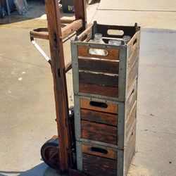 Antique Dolly and milk cases.