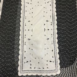 Table dresser, antique runner with crochet on the edge. Do I leave looking?