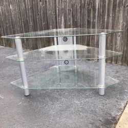 Glass Corner Table 43”length, Depth 24”,height 22”