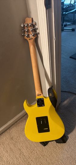 Yellow Greg Bennett Malibu MB-1 electric guitar by Samick
