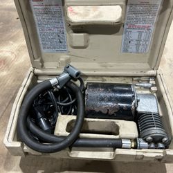 Vintage portable Coleman air compressor 150