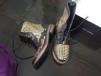 Size 7 unisex Steve madden boots