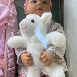 BABY EMMA DOLL NEW WITH BROWN  EYES . 