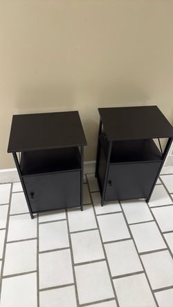 Two impeccable black night stands