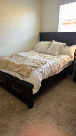 Dark wood bed