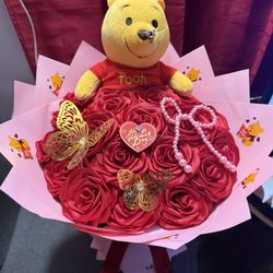 pink and red winnie the pooh 