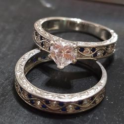 Rings marked .925 the two for $35. Pick-up In Aurora.