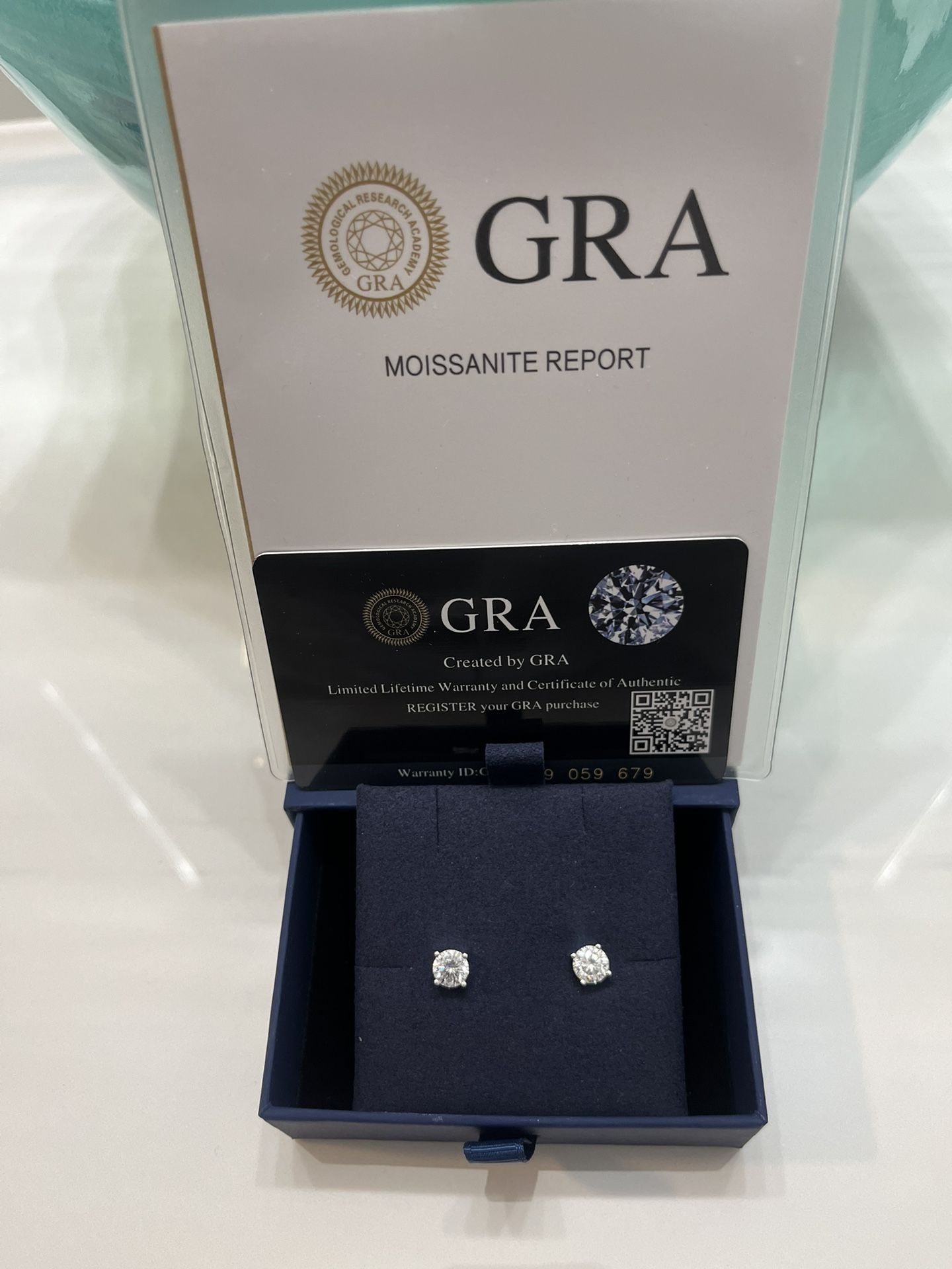Luxury shine on a budget: 2 Carat Round-Cut GRA-Certified Moissanite studs that hit like diamonds.