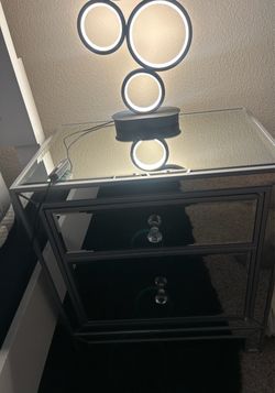 2 glass nightstands