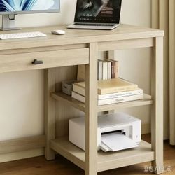 A computer desk with a pull-out keyboard tray and drawers, in natural wood color, measuring 58 inches wide × 22 inches deep × 29.5 inches high