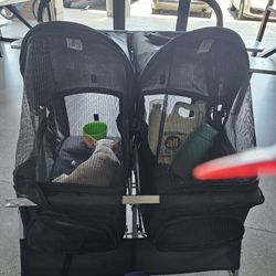 Dog stroller fits four dogs