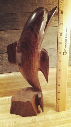 Ironwood dolphin carving statue