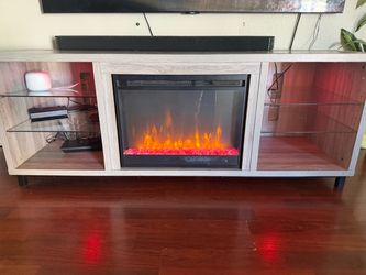 TV stand with fireplace for sale! $100 OBO