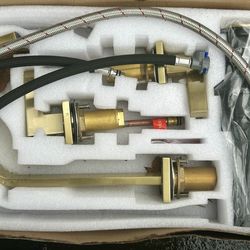 Kingston Brass Fauceture NuvoFusion bathroom faucet in a brushed brass