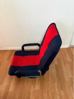 360-degree swivel floor gaming chair.