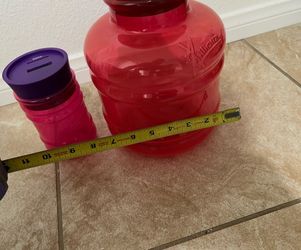 Large and small hot pink coin counter