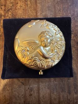 Estee Lauder May Angel Compact Translucent Pressed Powder 06 Lucidity Cherub VTG   This is a genuine vintage Estée Lauder compact from the 1990s. It i
