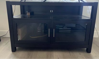 Black tv stand with two door cabinet