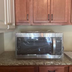 Brand New Whirlpool 1.7 Cu. Ft. Microwave Over The Range 30inch