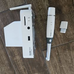 Non-working, parts-only Kodak/Carestream 1500 Intraoral Camera kit with two batteries and a dock.