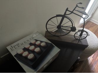 Candles and metal bike decor