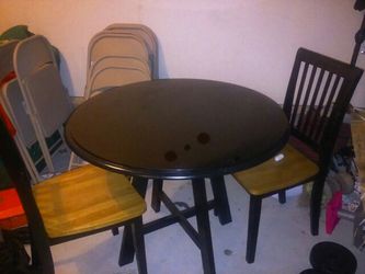 Dining table with glass top overlay and 2 chairs