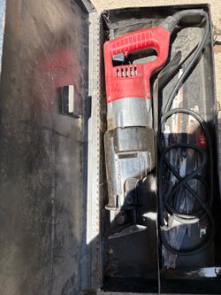 Milwaukee Sawzall Reciprocating Saw (with metal case & blades)
