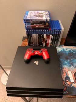 PlayStation 4 Pro Console with Red DualShock Controller