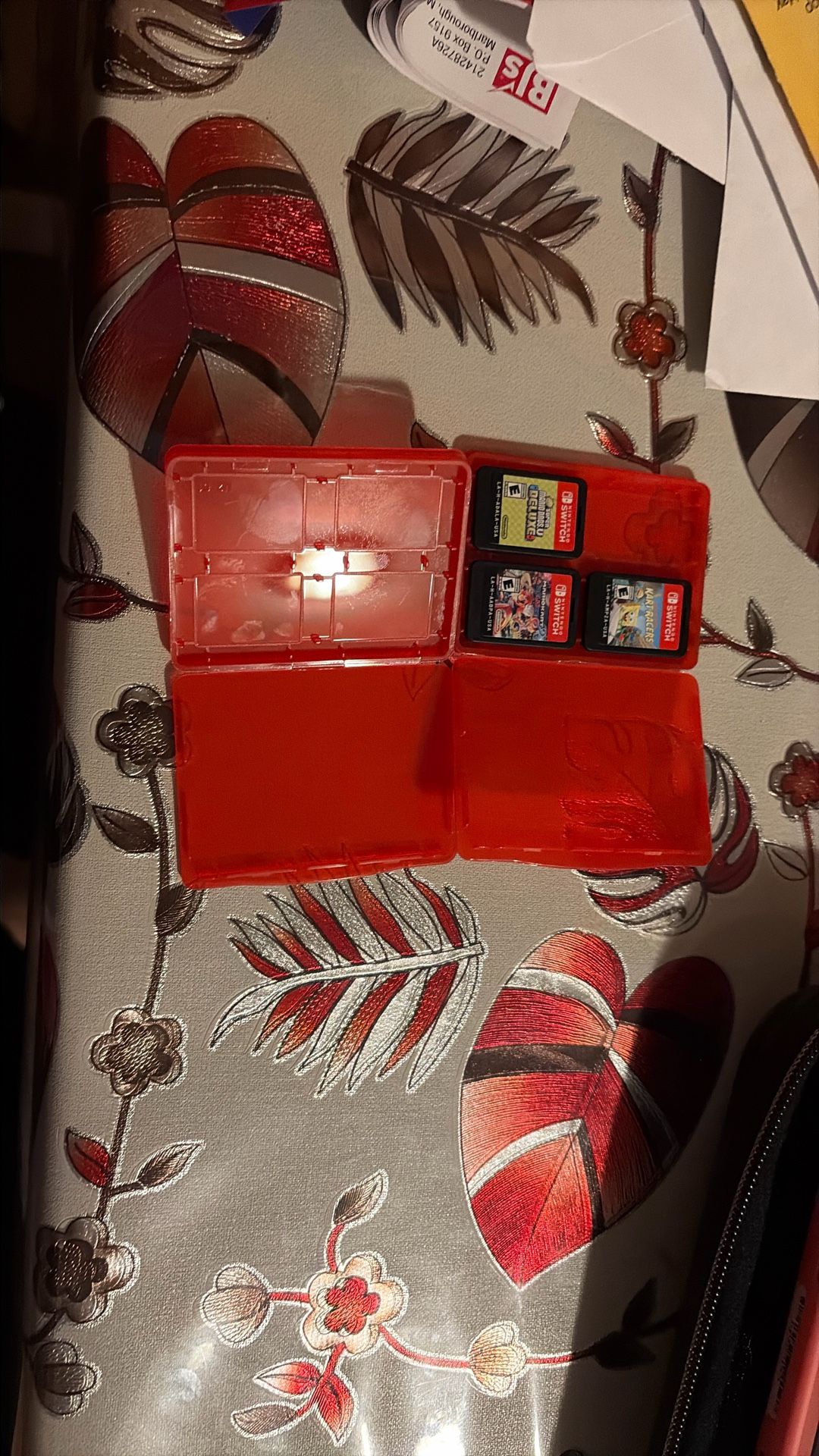 Nintendo Switch™ Lite - Coral And Three Game  With Case Included