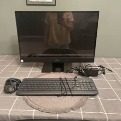 A Dell Gaming Computer With Keyboard,Mouse In Charger