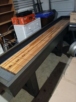 14 foot shuffleboard. Never used.  Man Cave Upgrade