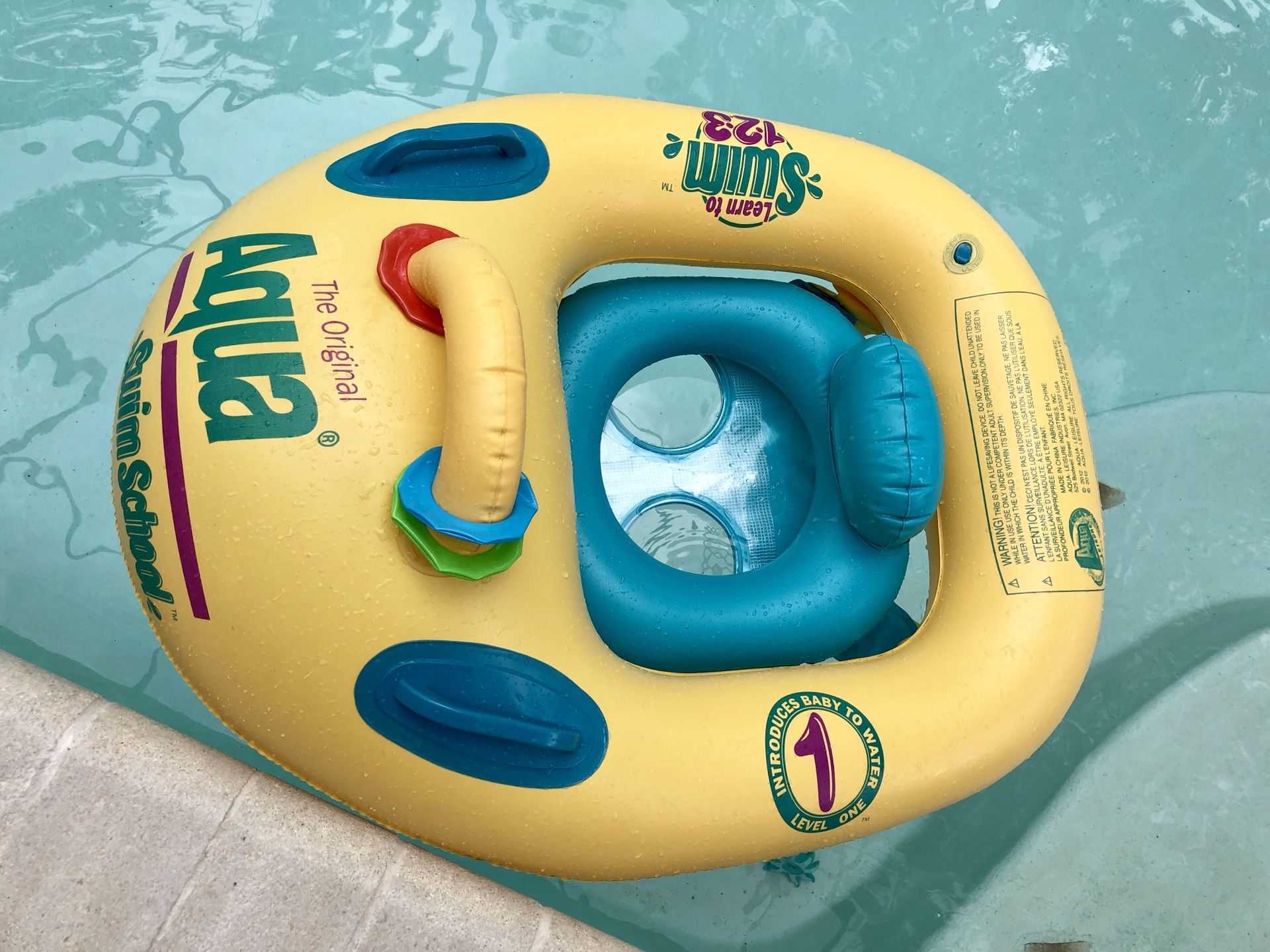 Gently used Swim School By Aqua-Leisure Classic Baby Boat With Activity Bar 6-18 Mos Level 1