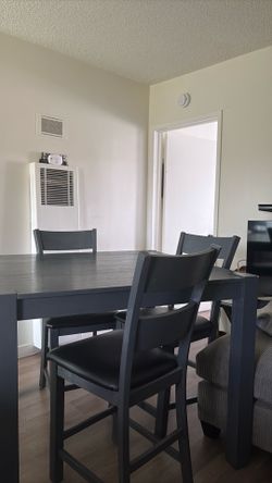 Dining Table with 4 Chairs - Good Condition