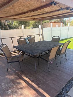 Patio table and 6 chairs