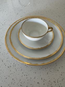 Gold Rimmed Glasses And Plates