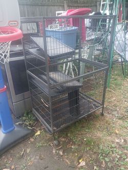 Metal ferret cage with 3 doors and wheels