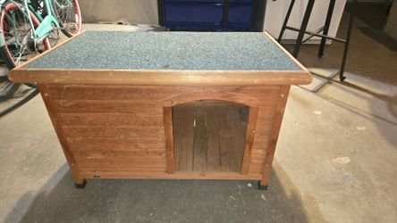 Wooden outdoor dog house