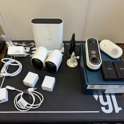 Arlo Ultra 2 and Essential Wireless Video Doorbell w/ Chime, extra battery and Hub