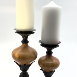 This rare set of 2 alabaster and metal candle holders features a stunning gold and black color combination. The larger candle holder measures 10.5 inc