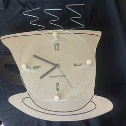 Cute sizzling, hot cup of tea wall clock